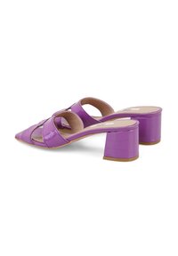 Purple patent leather mules with pointed toes, open sides, and chunky heels featuring a textured crocodile pattern.