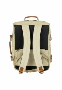Zaino beige con pannelli in rete nera e spalline regolabili. Presenta una maniglia superiore e dettagli beige. Scomparto frontale con zip.