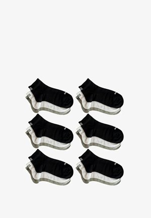 Pack of six socks featuring a black upper section and contrasting white or gray lower section, soft fabric, and a short ankle design.