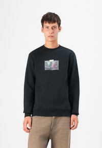 Black crewneck sweatshirt made of cotton blend, featuring a geometric graphic print on the front, solid color, and ribbed cuffs and hem.