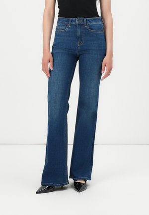 Dark blue denim flared jeans with a high waist, featuring five pockets, visible stitching, and a button-fly closure.