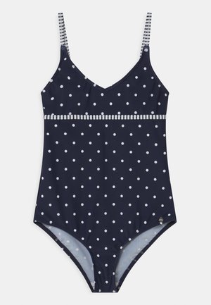 Navyblauer Badeanzug mit weißen Punkten, gestreiften Trägern und einem strukturierten Band an der Taille. Glatte Stoffoberfläche.