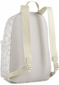 Zaino beige chiaro con motivo floreale, tessuto imbottito, spallacci regolabili e una tasca laterale. Presenta una superficie liscia e cuciture rinforzate.