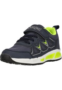 Baskets de sport bleu marine avec empeigne en mesh, accents gris et vert fluo, bande Velcro et semelle rembourrée avec unités d'air visibles.
