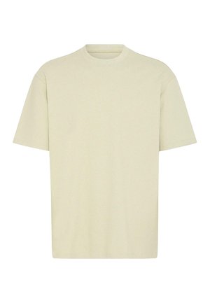 Hellbeiges T-Shirt mit kurzen Ärmeln und rundem Halsausschnitt. Weicher Baumwollstoff, entspannte Passform und minimalistisches Design. Keine Muster oder Verzierungen sichtbar.