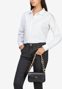 Miriade Clutch - nero