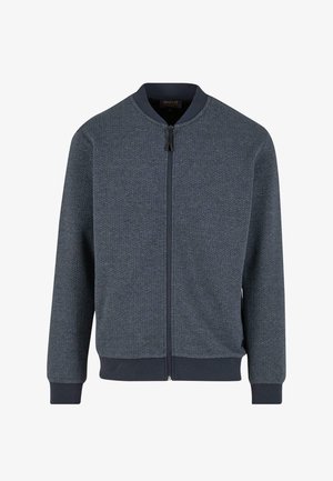 Mornarsko modra bombaška jakna z teksturiranim vzorcem, sprednjim zapenjanjem na zadrgo, rebrastim ovratnikom, manšetami in robom, izdelana iz mehkega tkane tkanine.