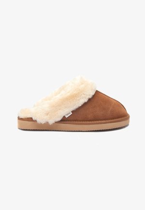 Pantofole in suede marrone con un morbido colletto in pelliccia crema e suola in gomma leggera, dotate di un piccolo etichetta del marchio sul lato.
