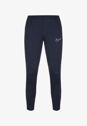 Navy sportleggings gemaakt van rekbare stof met een elastische tailleband en een klein wit Nike-logo op het bovenste deel van het linkerbeen.
