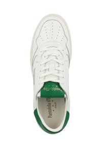 White leather sneakers with perforated toe, green accent on heel and tongue, flat laces, and printed brand logo inside.