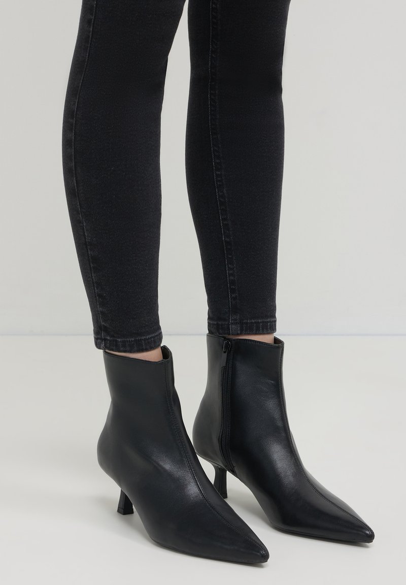 Calliope EFFETTO - Ankle Boot - nero