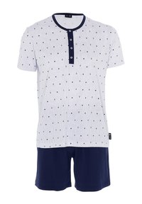 Completo pigiama a manica corta con una maglietta bianca a coste decorata con pois blu e colletto blu, abbinato a pantaloni corti blu uni. Bottoni davanti.