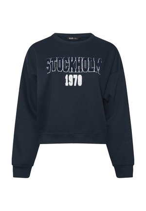 Laivansinis sweatshirt pitkähihaisilla, lyhytnäköinen muoto, pyöreä pääntie ja valkoinen "STOCKHOLM 1978" -painatus edessä. Pehmeä kangas.