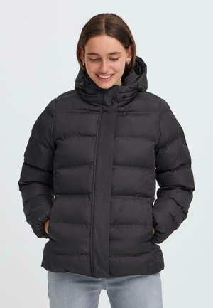 Black puffer jacket with a high collar, horizontal stitching, and a drawstring hood. Features side pockets and a relaxed fit.