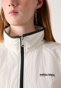Calvin Klein Jeans RETRO TRACK JACKET - Training jacket - tofu