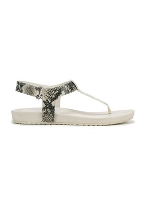 Flat sandals with a textured, snake-print strap in black and gray, featuring a T-strap design and a light-colored cushioned sole.