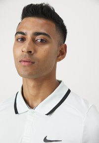 Nike Performance Poloshirt - barely green/black