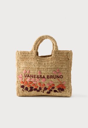 Bolsa tote de rafia color tostado tejida a mano con asas redondeadas, bordada con "VANESSA BRUNO" y diseños florales en rosa, naranja y púrpura.