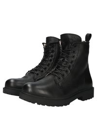 Stivaletti alla caviglia in pelle nera con finitura testurizzata, punta rotonda, colletto imbottito, design con lacci e suola in gomma resistente per una buona trazione.