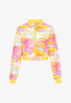 Skórzana kurtka bombowiec w jaskrawych różowych, żółtych i niebieskich abstrakcyjnych wzorach. Posiada zamek z przodu, ściągacze przy mankietach oraz kołnierz.