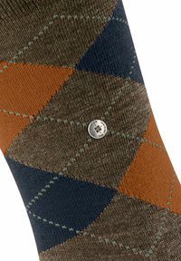 Calzino a motivo argyle marrone e arancione con accenti blu, in tessuto a maglia testurizzata, dotato di un piccolo bottone logo in argento.