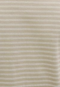 Light beige fabric with thin white horizontal stripes. Smooth texture, knit design, showcasing a subtle pattern throughout.