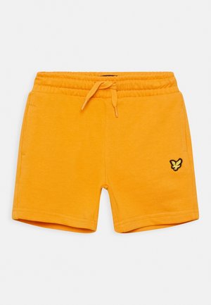 Shorts pour tout-petits orange vif avec taille élastique, cordon de serrage, poches latérales et petit logo papillon sur la jambe gauche.