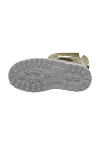 Zielone zamszowe botki z białą dekoracyjną kokardą; teksturowana szara gumowa podeszwa z wzorami kwiatowymi i głębokimi rowkami dla lepszej przyczepności.