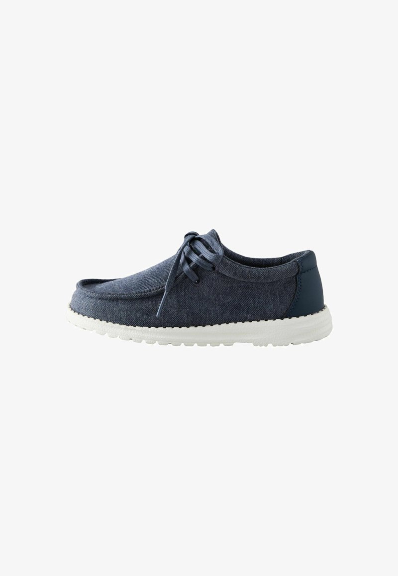 Casual navy blue fabric shoe with white sole and laces, featuring a low top and rounded toe design.