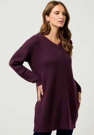 - Sweter