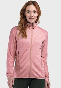 Helle pinke Zip-Jacke aus strukturiertem Stoff, mit hohem Kragen und zwei seitlichen Taschen. Verfügt über ein kleines Logo im Brustbereich.
