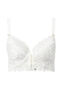 Witte kant bralette met golvende randen, bloempatronen, verstelbare bandjes en een midden sluiting. Kenmerkt zich door een klein decoratief knoopdetail.