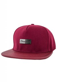 Maroon snapback cap with a fabric upper and a smooth plastic brim. Features a silver rectangular logo on the front. Textured finish.