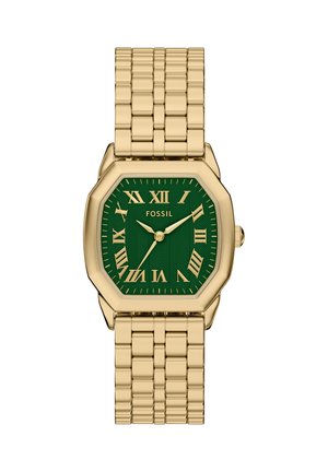 Gold metal wristwatch with green dial, gold Roman numerals, three gold hands, and Fossil logo, featuring a linked bracelet band.