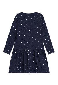 Marineblaues langärmliges Kleid mit weißen Punkten, das einen gerafften Rock und einen runden Ausschnitt hat. Weicher, dehnbarer Stoff.