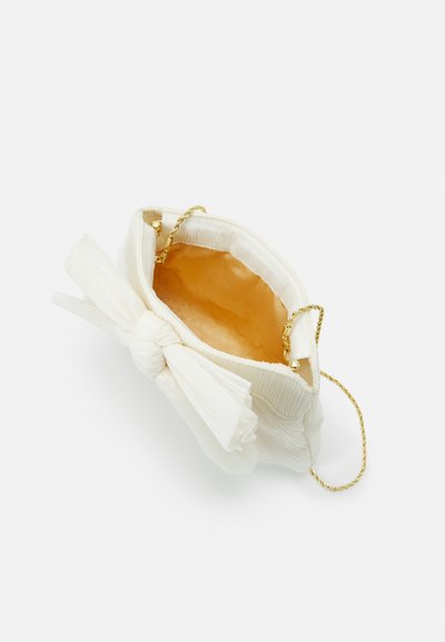 White pleated clutch handbag with a bow detail, gold chain strap, and contrasting orange interior lining. Textured fabric with a soft finish.