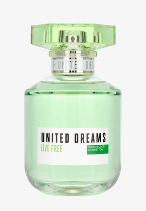 Flacon de parfum transparent vert clair étiqueté « United Dreams Live Free » par United Colors of Benetton avec un bouchon vert facetté.