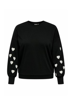 Gros pull noir à manches longues avec des broderies en forme de cœur blanches le long des manches. Tissu doux et ourlet côtelé.
