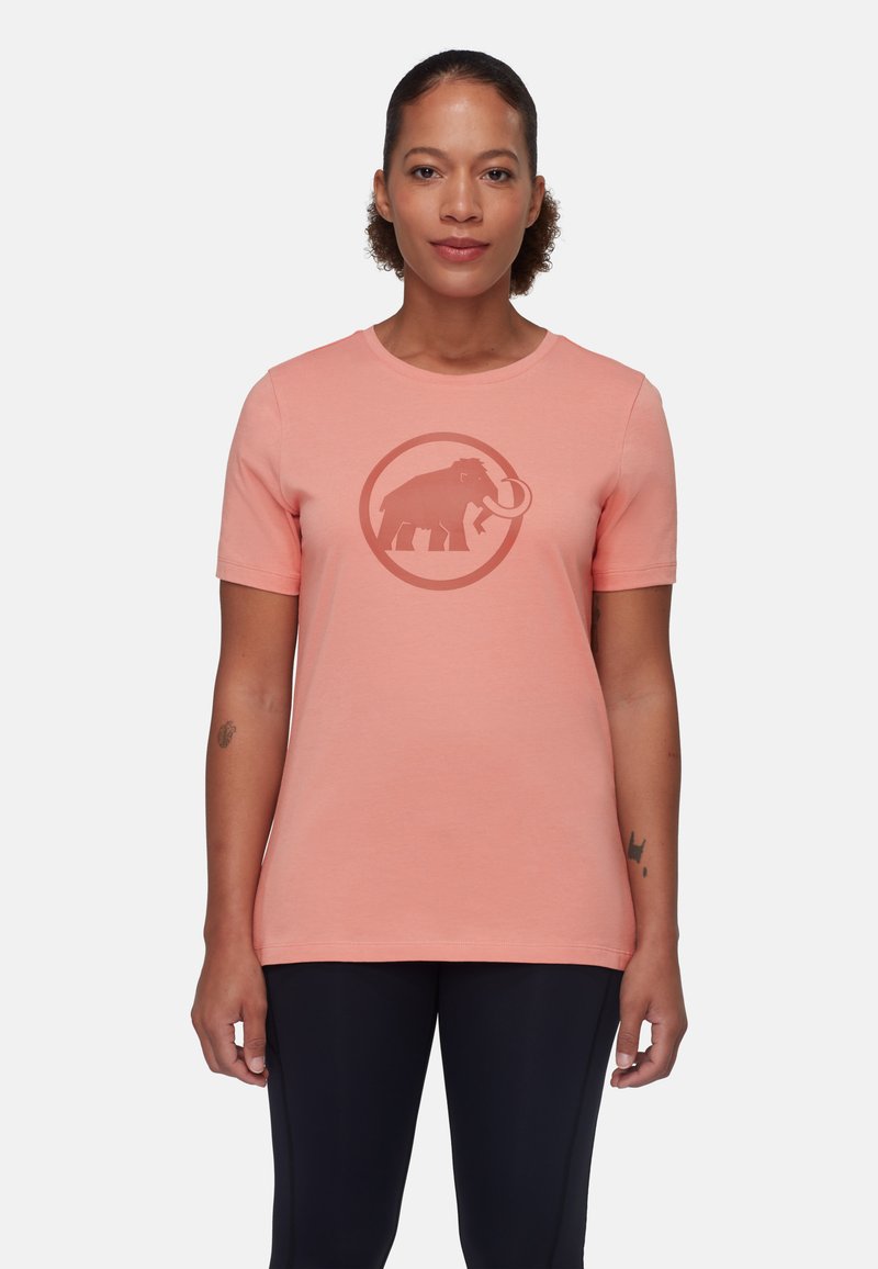 Kortærmet, koralfarvet bomulds T-shirt med et cirkulært grafisk motiv af en elefant i en mørkere nuance. Glat tekstur, rund halsudskæring.