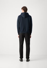 Tommy Hilfiger NEW YORK HOODY - Sweatshirt - desert sky