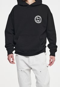 Pegador Luvtröja - black