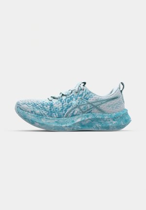 Light blue athletic shoe with a textured upper, breathable mesh design, and a patterned sole. Features a cushioned FF Blast+ midsole.