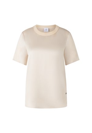 Beige T-Shirt mit kurzen Ärmeln, rundem geripptem Ausschnitt, glatter Textur und einem kleinen Logo-Akzent am Saum. Lässige Passform mit minimalistischem Design.