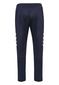 Navy blue athletic pants with elastic waistband and white chevron stripes on outer sides, tapered legs, and ankle zippers.