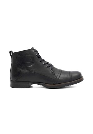 Bottine en cuir noir avec lacets, détail de sangle latérale et petit talon empilé, vue de profil extérieur sur fond blanc.
