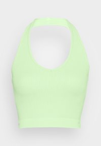 Top cropped canelado em verde claro, com decote halter e design justo. A textura é suave com um leve stretch.