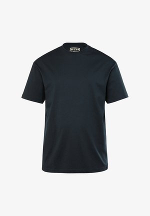 T-shirt en coton bleu marine à manches courtes, avec un col rond et une coupe droite. Présente une petite étiquette de marque à l'intérieur du col.