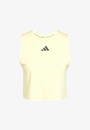 Korte mouwloze top van zacht gele stof met een ronde halslijn en een donkergrijs Adidas-logo op de borst. Gladde textuur.
