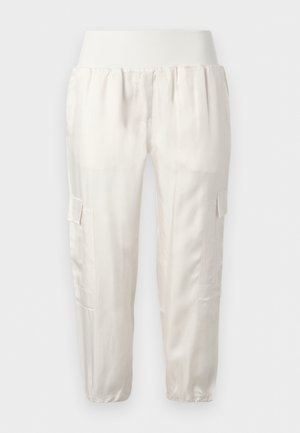 White elastic waist cargo pants with side flap pockets and elastic cuffs, displayed against a plain background.