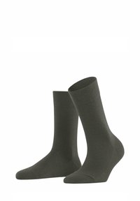 Grüne Baumwollsocken mit glatter Textur, in mittellanger Höhe bis zur Wade und nahtlosem Design. Verfügt über verstärkte Zehen- und Fersenbereiche für Langlebigkeit.